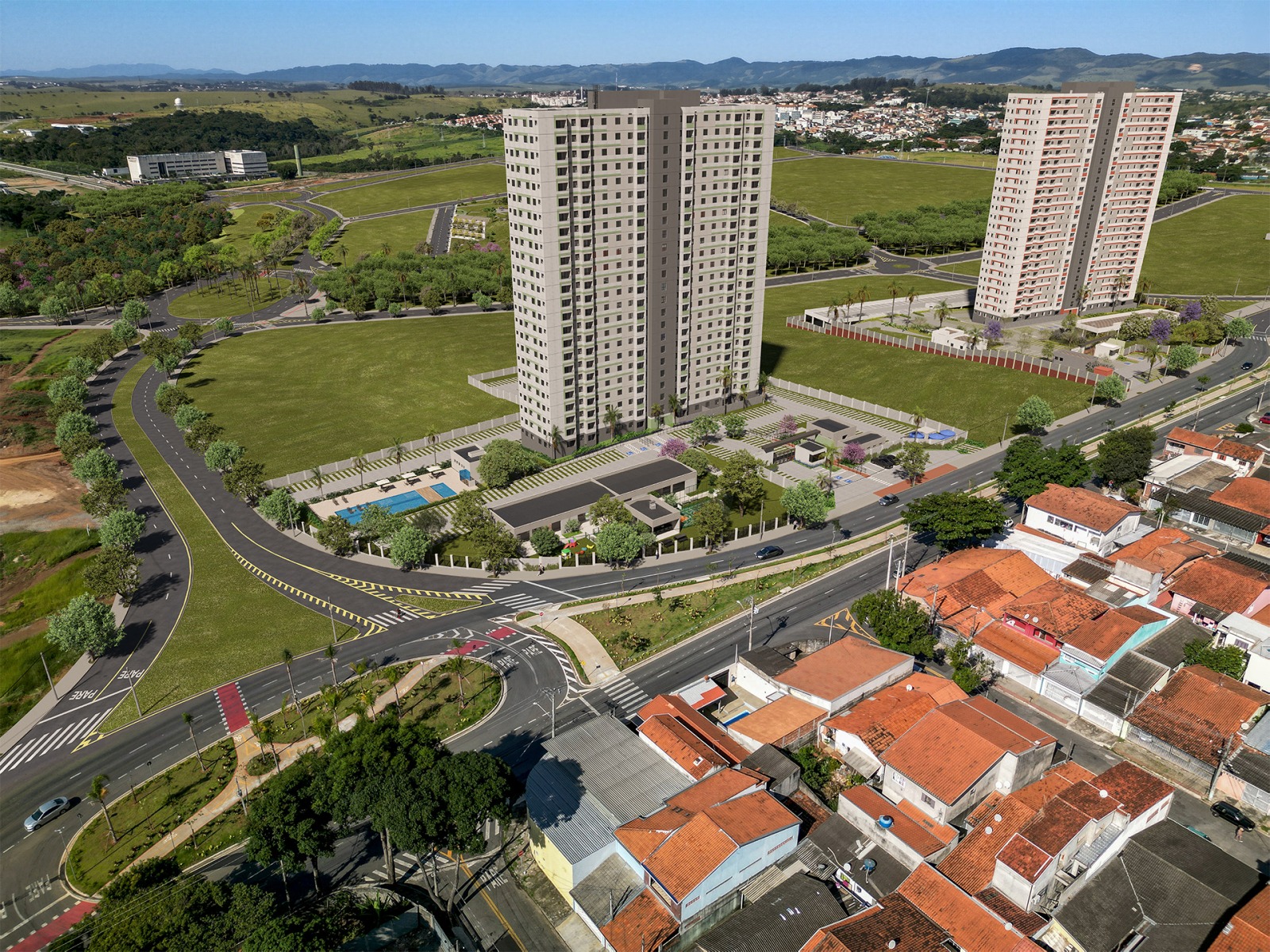 Vista aérea do Residencial Caminho dos Alecrins, com as torres, piscina e entorno